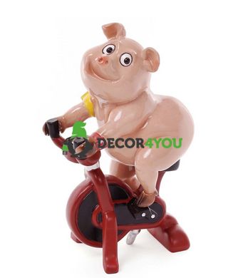 купити Декоративна статуетка Свинка на велотренажері 2