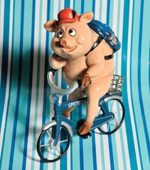 купить Декоративная статуетка Свинка на велосипеде 1